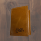Tan Leather State Script Debossed Wallets